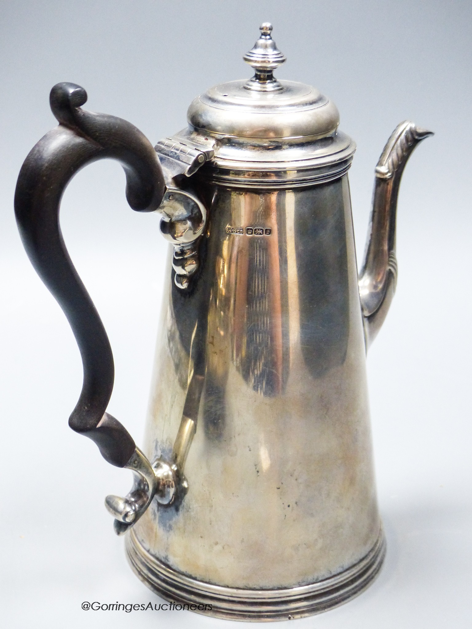 A George V 18th century style silver coffee pot, Henry Stratford Ltd, Sheffield, 1910, height 22.5cm, gross 25.5oz.